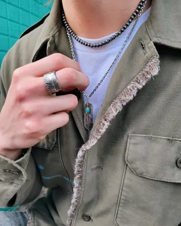 フェザー(左向き)天然石ターコイズ シルバー925 オキシダイズ