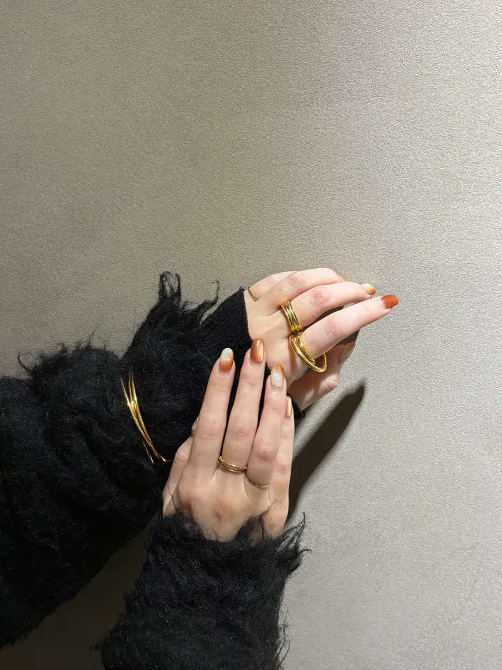 ゴールド]ツイストアーチバングル