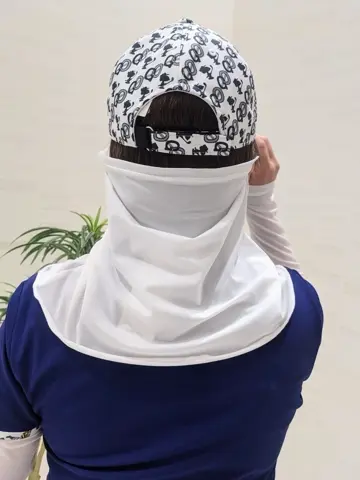 23区GOLF 市川真理子 コーディネート画像