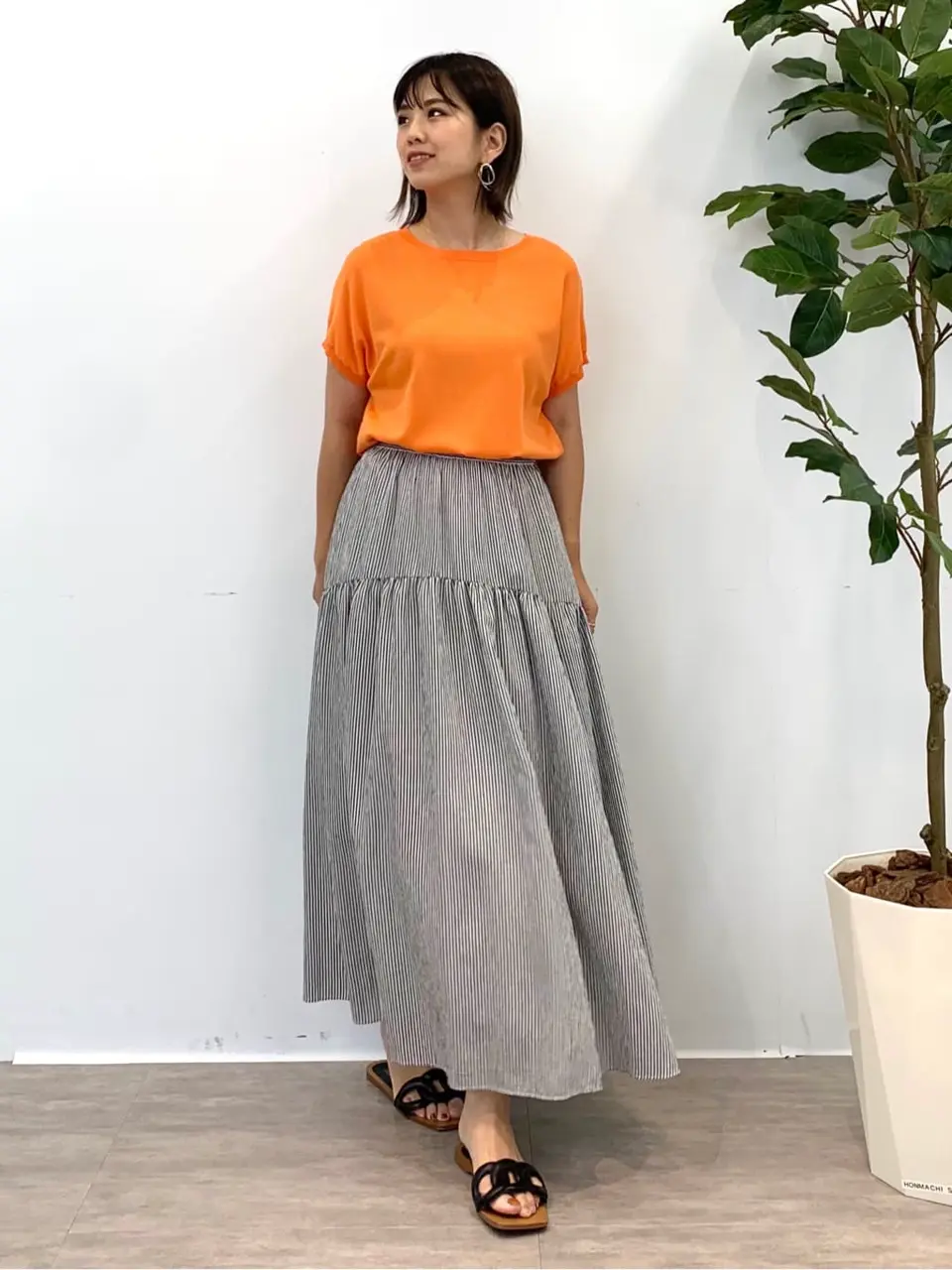  tomo コーディネート画像